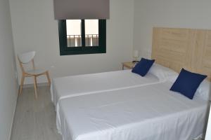 Posteľ alebo postele v izbe v ubytovaní Apartamento Trempat