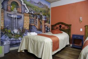 Ліжко або ліжка в номері Isabela Hotel Suite