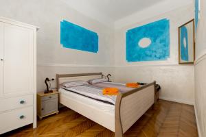 Posteľ alebo postele v izbe v ubytovaní Budapestapartment9