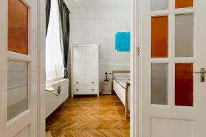 Posteľ alebo postele v izbe v ubytovaní Budapestapartment9