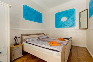 Posteľ alebo postele v izbe v ubytovaní Budapestapartment9
