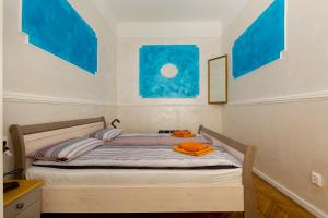 Posteľ alebo postele v izbe v ubytovaní Budapestapartment9
