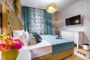 Postel nebo postele na pokoji v ubytování Dominus Rooms