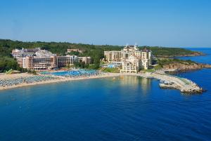 an aerial view of a beach with hotels and buildings at Duni Pelican Hotel - All Inclusive in Sozopol