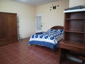Voodi või voodid majutusasutuse Apartamento Golden toas