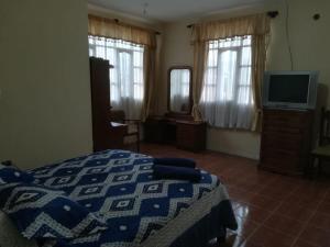 Voodi või voodid majutusasutuse Apartamento Golden toas