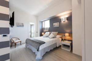 Postel nebo postele na pokoji v ubytování Relais Buonviaggio