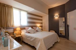 Postel nebo postele na pokoji v ubytování Relais Buonviaggio