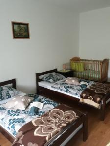 Postel nebo postele na pokoji v ubytování Apartman Luka