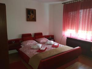 Postel nebo postele na pokoji v ubytování Apartman Luka