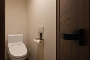 Koupelna v ubytování Enoca Hotel