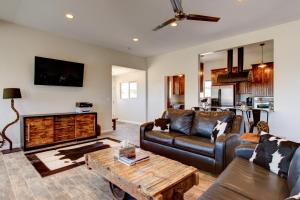 a living room with a couch and a coffee table at The Lookout at Sevier River in Hatch