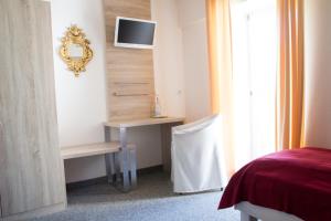 TV a/nebo společenská místnost v ubytování Hotel Gewürzmühle