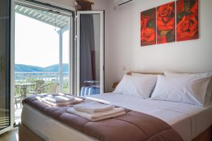 Posteľ alebo postele v izbe v ubytovaní Abeli Villas