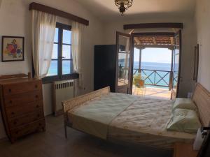 Postel nebo postele na pokoji v ubytování Unique Sea View House