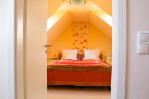 Postel nebo postele na pokoji v ubytování Hotel Gewürzmühle