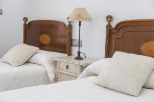 Postel nebo postele na pokoji v ubytování Victoria Port Javea + 45 fotografií