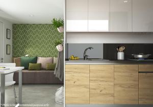 a kitchen and a living room with a couch at Camping Home Adriamar in Novigrad Istria