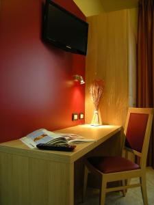 TV a/nebo společenská místnost v ubytování Hotel San Carlo