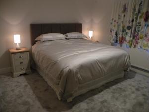 Кровать или кровати в номере Woodfield Self-Catering apartment