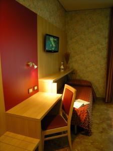 TV a/nebo společenská místnost v ubytování Hotel San Carlo