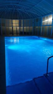 Der Swimmingpool an oder in der Nähe von casa luxury 2 nudista