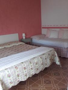 Posteľ alebo postele v izbe v ubytovaní Casa Palmira