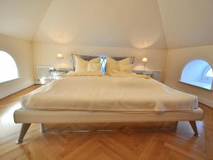 Ein Bett oder Betten in einem Zimmer der Unterkunft Villa Andante Apartmenthotel