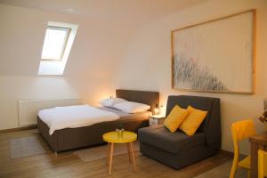 Posteľ alebo postele v izbe v ubytovaní Apartmani Mursa