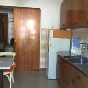 Kuchyň nebo kuchyňský kout v ubytování Nakou House