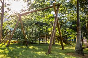 Um jardim em Pousada Maritacas do Sana