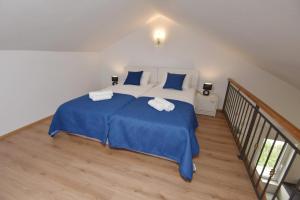 Postel nebo postele na pokoji v ubytování Apartments Lorena