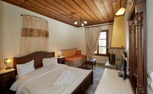 Ένα ή περισσότερα κρεβάτια σε δωμάτιο στο Hotel Atrapos 