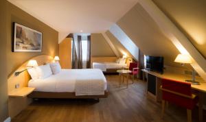 Voodi või voodid majutusasutuse HANNONG Hotel & Wine Bar toas