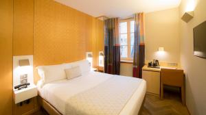 Voodi või voodid majutusasutuse HANNONG Hotel & Wine Bar toas