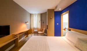 Voodi või voodid majutusasutuse HANNONG Hotel & Wine Bar toas