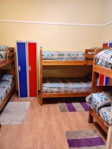 Cama ou camas em um quarto em Hostal Arenas del Mar
