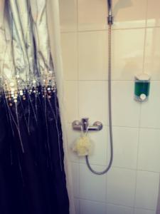 Um banheiro em Hostal Arenas del Mar