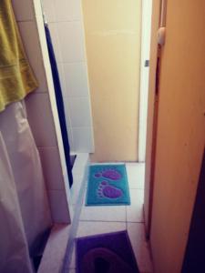 Um banheiro em Hostal Arenas del Mar