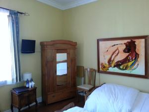 Krevet ili kreveti u jedinici u okviru objekta Hotel Manoir Atkinson