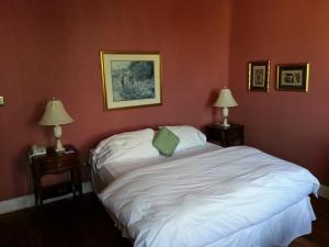 Krevet ili kreveti u jedinici u okviru objekta Hotel Manoir Atkinson