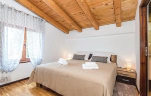 Postel nebo postele na pokoji v ubytování Villa Nino