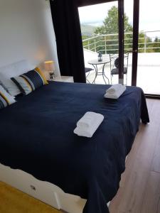 Postel nebo postele na pokoji v ubytování Villa Nino