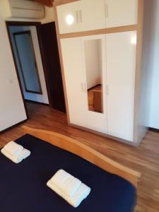 Postel nebo postele na pokoji v ubytování Villa Nino