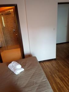 Postel nebo postele na pokoji v ubytování Villa Nino