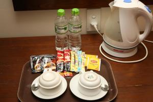 Příslušenství pro přípravu čaje a kávy v ubytování Arcadia Phu Quoc Resort