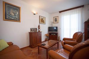 TV a/nebo společenská místnost v ubytování Apartment Pia