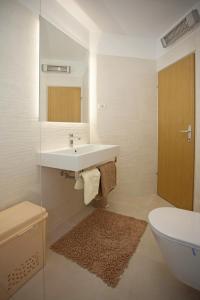 Koupelna v ubytování Apartment Pia + 16 fotografií