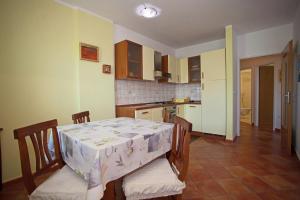 Kuchyň nebo kuchyňský kout v ubytování Apartment Pia