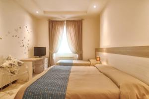 アラッシオにあるHotel Bel Sitのギャラリーの写真 +15枚の写真